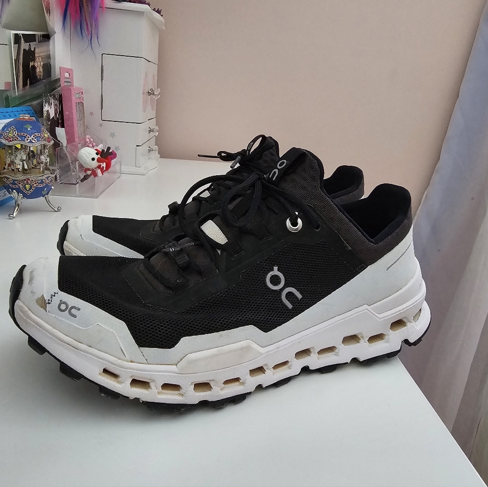 On Running Black and White Cloud Running Sneakers